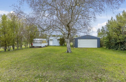 Te Rangiita Cottage | Family-Friendly Cedar Cottage in Tauranga Taupo