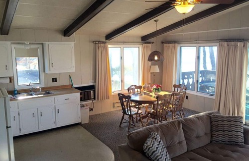 Prudenville Cottage | Lake View Family Retreat at Cedar Oaks Lakeside Resort