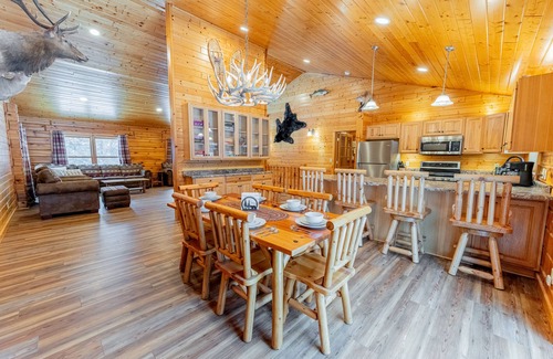 Munising Cabin | Discover Cedar Pine Lodge with Pool & Nearby ORV Trails