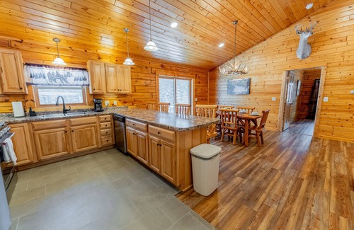 Munising Cabin | Discover Cedar Pine Lodge with Pool & Nearby ORV Trails