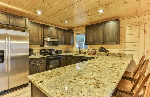 Ellijay Cabin | Riverfront Retreat: Hot Tub, Pet-Friendly & 10/10 Rated