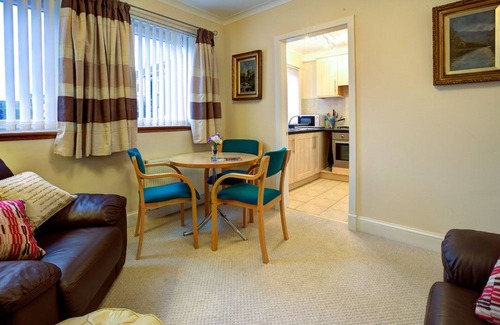 Kilmun Hotel | Experience Cedars Apartment: 4-Star Comfort & Family Amenities