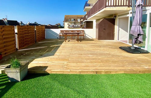 Bernieres-sur-Mer Apartment | Experience Celeno YourHostHelper: Family-Friendly Comfort