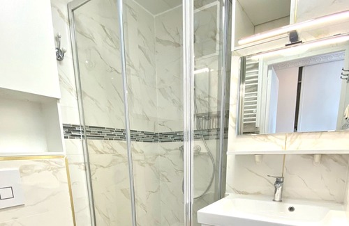 Bernieres-sur-Mer Apartment | Experience Celeno YourHostHelper: Family-Friendly Comfort