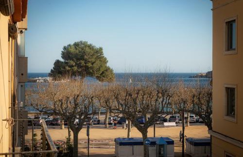 Sant Feliu de Guixols Apartment | Cozy Central Apartment Steps from the Beach with Parking