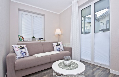 Gohren Apartment | Elegant Villa Buskam Apartment 22 with Pool & Balcony