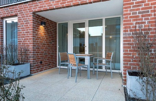 Langeoog Apartment | Central Apartment with Sunny Terrace, Steps from the Beach