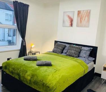 Lincoln House | Modern City Retreat with Hot Tub for Family Enjoyment