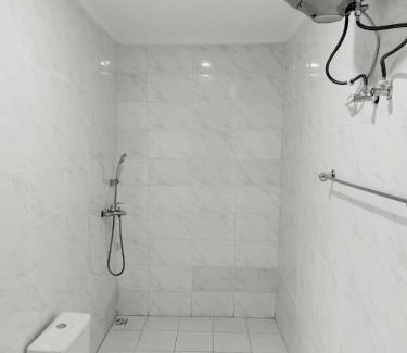 Orozo Hotel | Convenient Central District Apartment in Abuja with Hot Tub