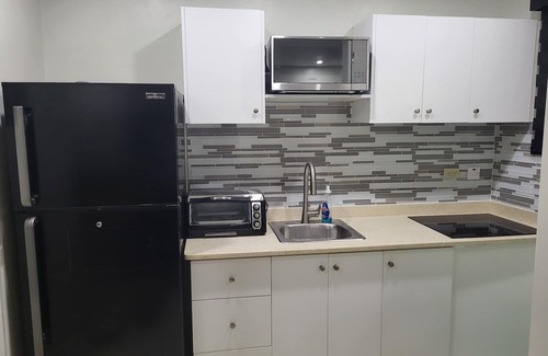 Eastwood Park Apartment | Modern 1-Bedroom Apartment with Breakfast & Secure Parking