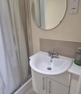 Whittington Apartment | Central Hotel: Secure Stay with Hot Tub and Pet-Friendly Options