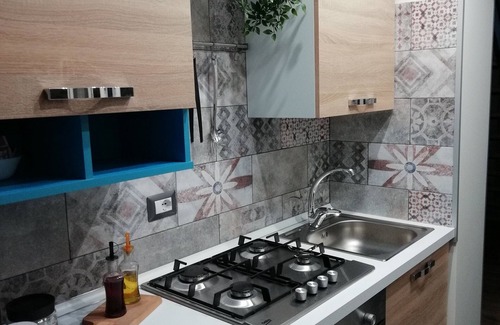 Picanello-Ognina-Barriera-Canalicchio Apartment | Central Station House "Mario": Comfort, Kitchen & Breakfast