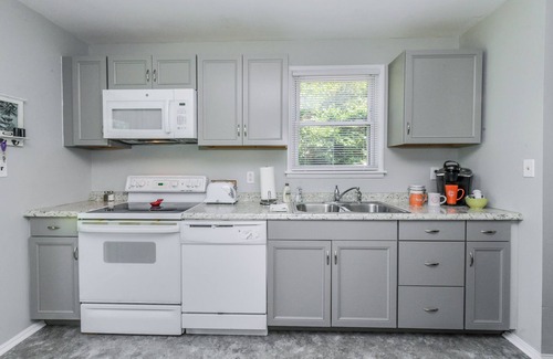 Executive Park House | Prime Location Pet-Friendly Retreat with Fenced Backyard