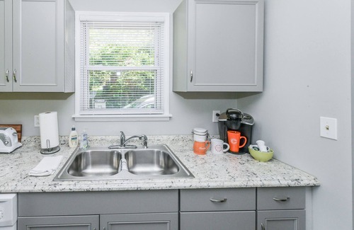 Executive Park House | Prime Location Pet-Friendly Retreat with Fenced Backyard