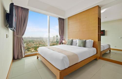 Bangka Apartment | Explore Cera by Kozystay - Kemang: Family-Friendly Retreat