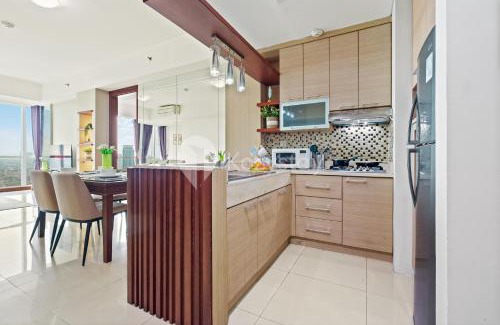 Bangka Apartment | Explore Cera by Kozystay - Kemang: Family-Friendly Retreat