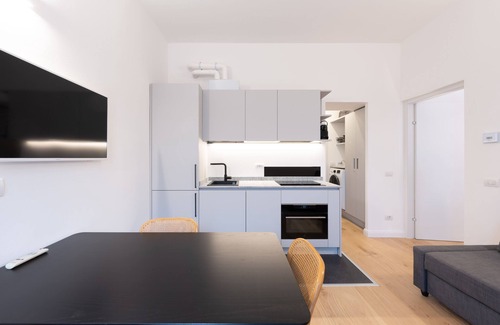 Cernobbio Apartment | Modern Oasis in Cernobbio with Spa and Parking Options
