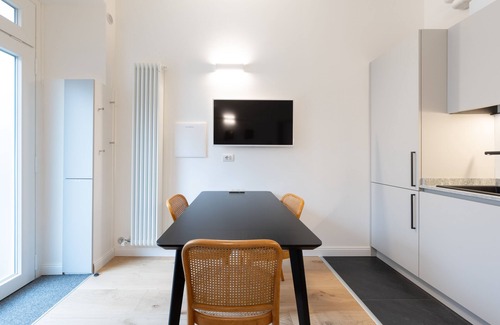 Cernobbio Apartment | Modern Oasis in Cernobbio with Spa and Parking Options