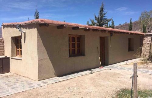Tilcara House | Discover Cerro Amarillo: Pet-Friendly Cabaña de Juella