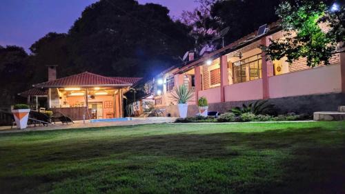Bueno Brandao House | Idyllic Chácara Alto do Vale: Oceanfront Retreat for Families