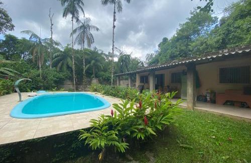 Cidade Jardim Tom House | Discover Chácara Dimel: Ocean View Retreat in Bertioga