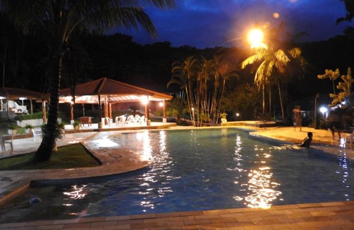 Peruibe House | Experience Chácara Pimentão Vermelho: A 10/10 Getaway