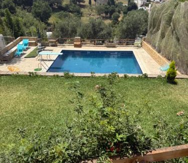 Tetouan Ski Chalet | Pet-Friendly Retreat at Châle Tetouan with Pool Access