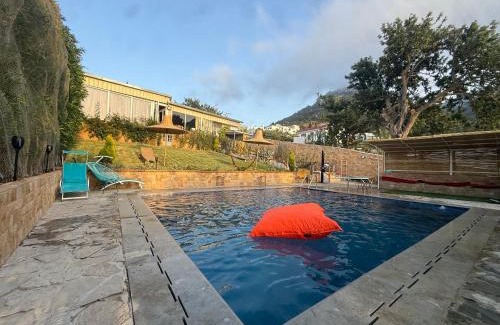 Tetouan Ski Chalet | Pet-Friendly Retreat at Châle Tetouan with Pool Access