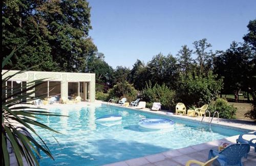 Rigny Hotel | Relax at Château de Rigny with Ocean Views & Pool Access