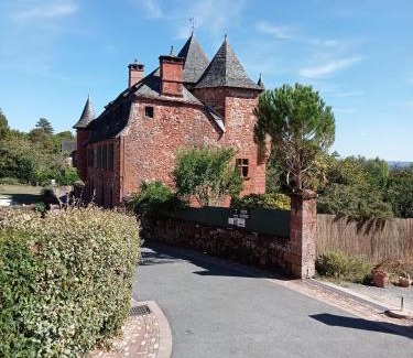 Collonges-la-Rouge House | Experience Château de Vassinhac: Poolside Oceanfront Retreat