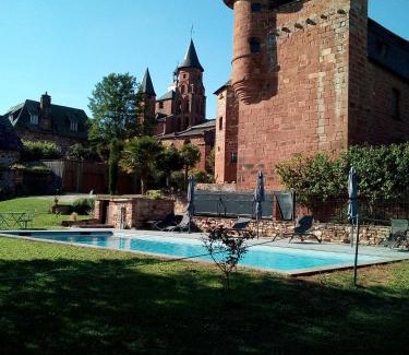 Collonges-la-Rouge House | Experience Château de Vassinhac: Poolside Oceanfront Retreat
