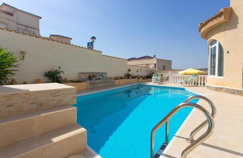 Rojales House | Idyllic CH Villa Plara: Oceanfront Retreat Near Golf