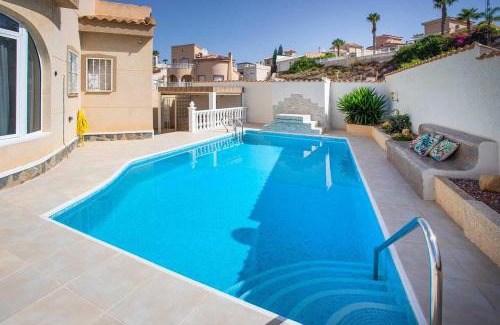 Rojales House | Idyllic CH Villa Plara: Oceanfront Retreat Near Golf