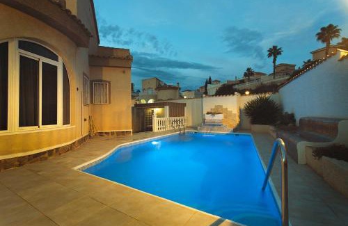 Rojales House | Idyllic CH Villa Plara: Oceanfront Retreat Near Golf
