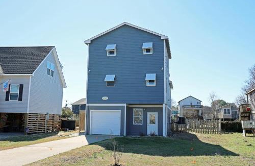 Colington Harbour House | Canal View 3-Bedroom Retreat with Cozy Fire Pit
