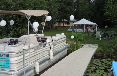 King Cottage | Elegant Chain of Lakes House with Pontoon Boat Access