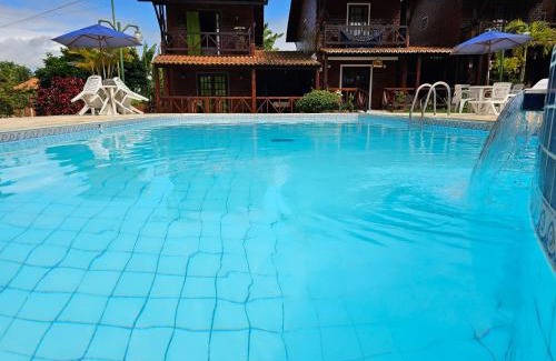 Novo Gravata Ski Chalet | Cozy Chalé with Pool View and Pet-Friendly Amenities