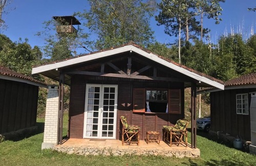 Juquitiba Ski Chalet | Explore Chalé Heliconia: Nature Retreat with Pool & Spa