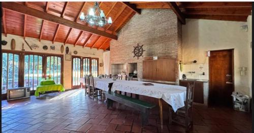 Punta Mogotes House | Cozy Chalé with Quincho and Park for Family Getaways