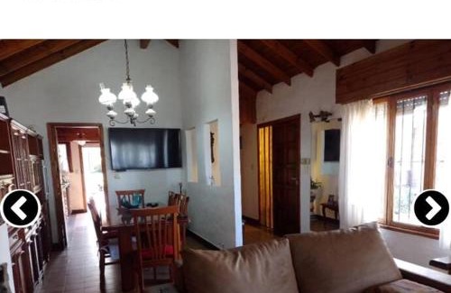 Punta Mogotes House | Cozy Chalé with Quincho and Park for Family Getaways