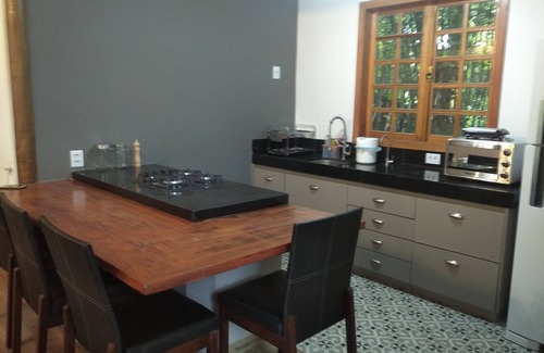 Belo Horizonte Ski Chalet | Cozy Rustic Chalé in Pampulha with Family-Friendly Perks