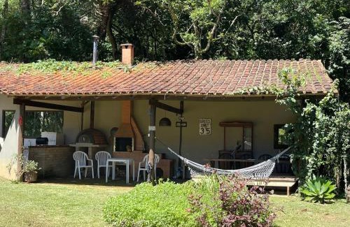 Santo Antonio do Pinhal Cabin | Discover Chalé Rio das Pedras: Oceanfront Getaway Awaits