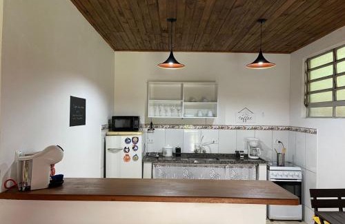 Santo Antonio do Pinhal Cabin | Discover Chalé Rio das Pedras: Oceanfront Getaway Awaits