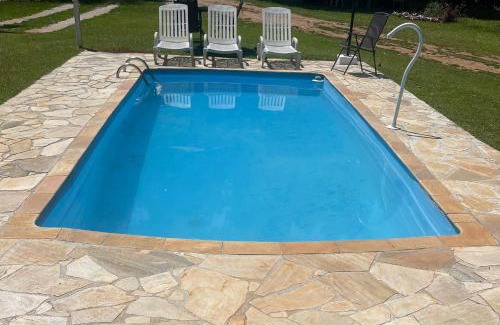 Santo Antonio do Pinhal Cabin | Discover Chalé Rio das Pedras: Oceanfront Getaway Awaits