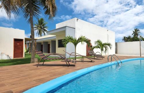 Sao Miguel de Touros Apartment | Pet-Friendly Casa Québec: Oceanfront with Pool & 9.5/10 Rating