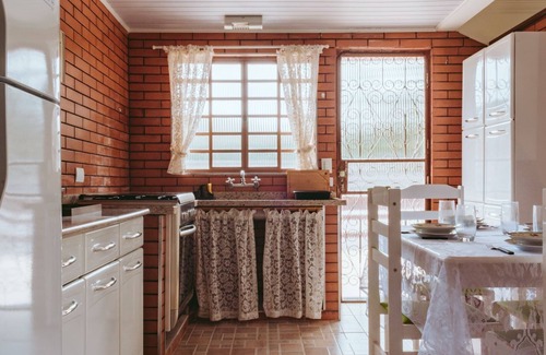 Campos do Jordao Apartment | Discover Comfort at Chalés Florestal with Pet-Friendly Amenities