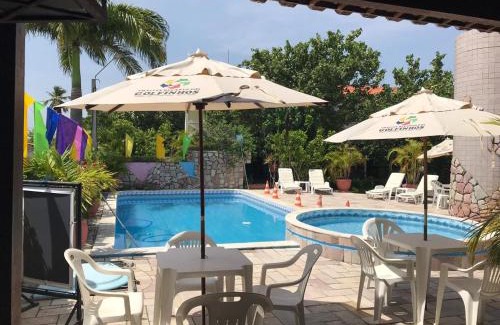 Loteamento Enseada dos Golfinhos Apartment | Pet-Friendly Chalés Recanto dos Golfinhos with Ocean View