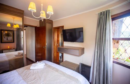 Jardim Andira Ski Chalet | Discover Chale dos Sonhos: 10/10 Rating & Cozy Amenities