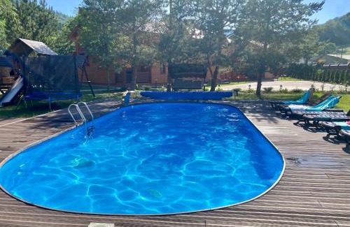 Mykulychyn House | Elegant Chalet Зоряні ночі with Ocean View & Pool Access