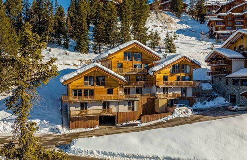 Belle Plagne Ski Chalet | Chalet, 50m from ski slopes, view mountain/street, sauna, terrace, balcony, fireplace or stove, tv